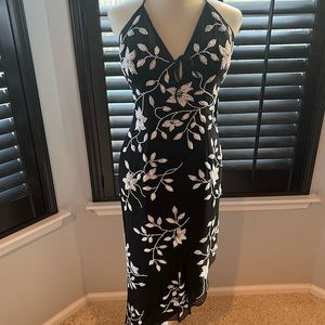Black assymetrical halter dress with beaded white flowers